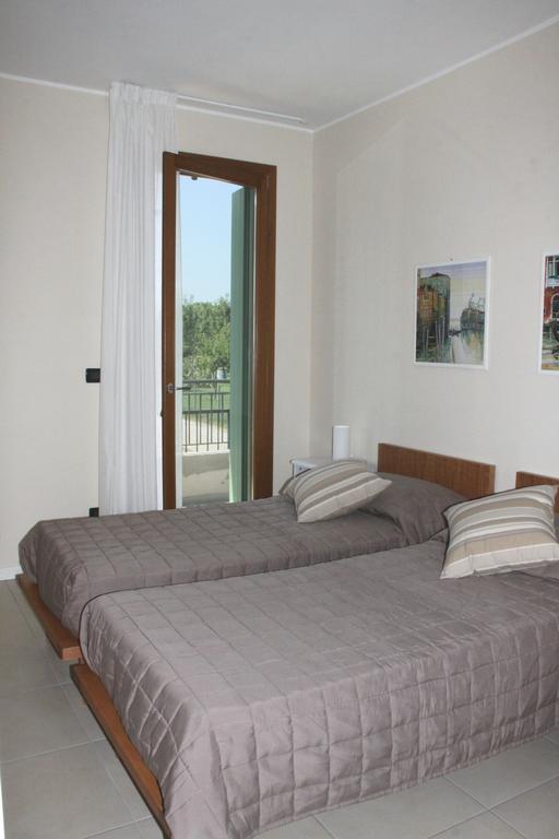 Apartmán Grillo Casa Vacanze Tessera Pokoj fotografie